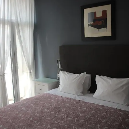 Pinho Apartments, And Casa de hóspedes 3*